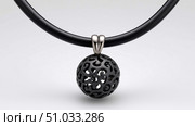 Wearable Air Purifier Necklace on White Background. Стоковое AI-изображение, AI-художник Katsiaryna Repich / Фотобанк Лори