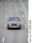 Car Rolls-Royce Phantom VII driving on highway road, above front view. Редакционное фото, фотограф Константин Григорьев / Фотобанк Лори