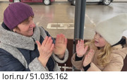 In the city park, a grandmother and her young granddaughter share joyful moments, swinging and running around happily. Стоковое видео, видеограф Ирина Старикова / Фотобанк Лори