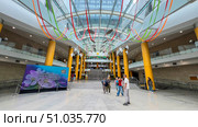 A large open space with a banner in the central foyer of the State Library of the Republic of Belarus. Belarus Minsk Street 09.08.25. Редакционное фото, фотограф Ярославский Максим / Фотобанк Лори