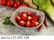 Sweet piquant cherry pepper stuffed cheese. Стоковое фото, фотограф Андрей Старостин / Фотобанк Лори