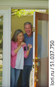 Joyful Moment of Celebration as a Couple Receives Their New Home Keys, Signifying the Start of Their New Journey Together and Excitement for New Beginnings. Стоковое AI-видео, аниматор Владимир Федоров / Фотобанк Лори