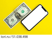 Mockup, smartphone and dollar on yellow background. Стоковое фото, фотограф Юлия Николаева / Фотобанк Лори