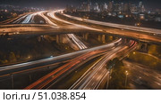 View a bustling freeway illuminated by the lights of passing vehicles, capturing the motion and energy of nighttime traffic. Стоковое AI-видео, аниматор Данила Большаков / Фотобанк Лори