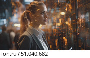 Business woman stands in front of a wall adorned with bright lights, creating a visually striking backdrop. Стоковое видео, видеограф Данила Большаков / Фотобанк Лори