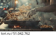 Person grills food on an outdoor grill, showcasing the cooking process with flames, smoke, and sizzling sounds. Стоковое AI-видео, аниматор Данила Большаков / Фотобанк Лори