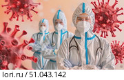 A group of medical workers wearing full protective gear while attending to patients in a healthcare setting. Стоковое AI-видео, аниматор Данила Большаков / Фотобанк Лори