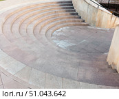 Outdoor granite staircase made in a semicircle in the form of an amphitheater. Стоковое фото, фотограф Константин Григорьев / Фотобанк Лори