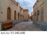 Samarkand, Uzbekistan, January 5, 2024: View of the historical and ethnographic complex "Eternal City" against the sunset sky. Редакционное фото, фотограф Ula Ulachka / Фотобанк Лори