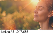 Charming woman with her eyes closed, appearing lost in deep thought or concentration. Стоковое AI-видео, аниматор Данила Большаков / Фотобанк Лори