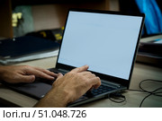 Man's hands in front of a monitor. Selective focus. The concept of recruitment. Стоковое фото, фотограф Анищенко Геннадий / Фотобанк Лори