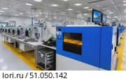Surface mount technology line operating in electronics factory. Стоковое AI-видео, аниматор Юрий Поздников / Фотобанк Лори