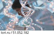 Researcher studies genetic material in modern laboratory environment focused on biotechnology advancements. Стоковое AI-видео, аниматор Сергей Толмачёв / Фотобанк Лори