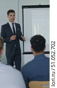 Engaging Corporate Presentation: A Professional Man Leads an Informative Session Followed by a Confident Businesswoman in a Meeting Setting with Data Visualizations. Стоковое AI-видео, аниматор Владимир Федоров / Фотобанк Лори