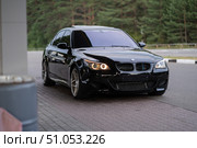KRASNOYARSK, RUSSIA - July 31, 2025: Black BMW M5 E60. Редакционное фото, фотограф Плотников Дмитрий / Фотобанк Лори