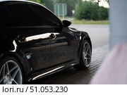 KRASNOYARSK, RUSSIA - July 31, 2025: Black BMW M5 E60. Редакционное фото, фотограф Плотников Дмитрий / Фотобанк Лори