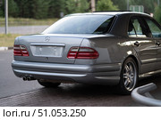 KRASNOYARSK, RUSSIA - July 31, 2025: Silver Mercedes Benz E class W210. Редакционное фото, фотограф Плотников Дмитрий / Фотобанк Лори