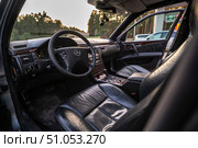 KRASNOYARSK, RUSSIA - July 31, 2025: Silver Mercedes Benz E class W210. Редакционное фото, фотограф Плотников Дмитрий / Фотобанк Лори