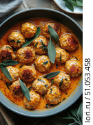 Hearty Meatballs Simmer in a Rich Tomato Sauce With Fresh Herbs for a Delicious Meal. Стоковое AI-изображение, AI-художник Юлия Гапеенко / Фотобанк Лори