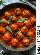 Homemade Meatballs Simmered in Rich Tomato Sauce With Fresh Herbs and Spices. Стоковое AI-изображение, AI-художник Юлия Гапеенко / Фотобанк Лори