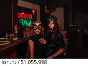 Masked Beauties Enjoy a Night out at Kavkaz Bar in Moscow, Russia (2021 год). Редакционное фото, фотограф Aleksandr Golubev / Фотобанк Лори