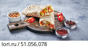 Eastern traditional shawarma with sauces. Стоковое фото, фотограф Ирина Буракова / Фотобанк Лори