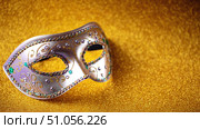 Festive, colorful Mardi Gras or carnivale mask on golden background. Venetian masks. Стоковое фото, фотограф Ирина Буракова / Фотобанк Лори