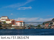 City view from the river Douro. Porto, Portugal. Dom Lu s I Bridge. Стоковое фото, фотограф Вера Федорова / Фотобанк Лори