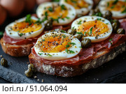 Tasty Open-Faced Sandwiches With Soft-Boiled Eggs for the Perfect Brunch Experience. Стоковое AI-изображение, AI-художник Юлия Гапеенко / Фотобанк Лори