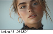 Portrait of a young woman with striking features and natural beauty captured in a modern setting. Стоковое AI-видео, аниматор Сергей Толмачёв / Фотобанк Лори