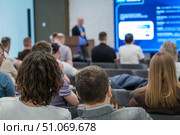 Attendees listening to a speaker in an educational business seminar. Стоковое фото, фотограф Антон Гвоздиков / Фотобанк Лори