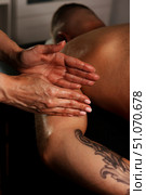 Embracing Serenity Through a Soothing Massage Experience in a Tranquil Indoor Setting. Стоковое фото, фотограф Aleksandr Golubev / Фотобанк Лори
