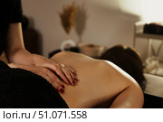 Relaxation Through Skilled Massage in a Serene Indoor Setting for Ultimate Comfort and Rejuvenation. Стоковое фото, фотограф Aleksandr Golubev / Фотобанк Лори