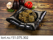 Stuffed dolma - meat in grape leaves. Стоковое фото, фотограф Андрей Старостин / Фотобанк Лори