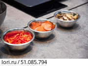 A set of ingredients for making pizza. Portioned food in metal bowls. Стоковое фото, фотограф Наталия Кирсанова / Фотобанк Лори