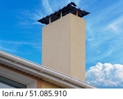 Дом с черепицей и с дымовой трубой. House from a brick with a pipe. Стоковое фото, фотограф Татьяна Д / Фотобанк Лори