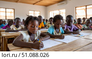 African children learning mathematics with large, colorful posters in a classroom filled with natural light. Black African children from disadvantaged families study in school, read books, receive primary education, volunteer service. Стоковое AI-изображение, AI-художник ALLA YURTAYEVA / Фотобанк Лори