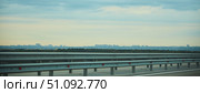 M4 Highway, Russia: May 04, 2022: The highway and the city of Rostov-on-Don in the distance. Редакционное фото, фотограф Наталия Кирсанова / Фотобанк Лори