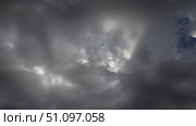 Beautiful dark dramatic sky with stormy clouds before rain or snow. Thunderstorm heaven landscape. Timelapse. Стоковое фото, фотограф Feruza Tashmetova / Фотобанк Лори