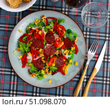 Vitamin salad of fresh vegetables, lettuce leaf, corn, bel pepper and chorizo. Стоковое фото, фотограф Яков Филимонов / Фотобанк Лори