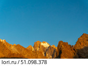 Sharp mountain summits, dramatic rocky spires, snow capped Korona peak. Ala-Archa Park, Ratsek camp. Alpine climbing, Hillwalking, daytrip. Trekking, hiking, alpinism, and outdoor exploration. Стоковое фото, фотограф Андрей Ка / Фотобанк Лори
