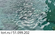 Open Ocean Water with Small Ripples and Sunlight Sparkles. Стоковое видео, видеограф Marina Gabdullina / Фотобанк Лори