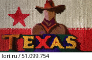 Western-themed tapestry with a cowboy hat-wearing sheriff holding a colorful Texas banner, against a backdrop featuring the lone star flag, symbolizing state pride and frontier history. Стоковое AI-изображение, AI-художник Андрей Ка / Фотобанк Лори