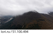 Low clouds covering mountain top in Navarre, Spain, on a cloudy day. Стоковое фото, фотограф Данил Руденко / Фотобанк Лори