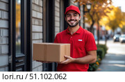 A man in a red shirt is holding a cardboard box. Стоковое AI-изображение, AI-художник Ярославский Максим / Фотобанк Лори