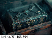 Mysterious ornate box emerging from smoke in antique chest. Стоковое AI-изображение, AI-художник Иван Рябоконь / Фотобанк Лори