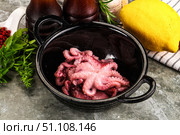 Marinated baby octopus snack appetizer. Стоковое фото, фотограф Андрей Старостин / Фотобанк Лори