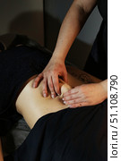 Stimulating Circulation Through Deep Tissue Abdominal Massage at Spa. Стоковое фото, фотограф Aleksandr Golubev / Фотобанк Лори