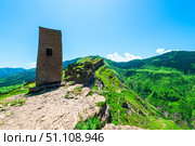 Picturesque mountain landscape with ruins of ancient towers on a steep cliff. North Caucasus (2024 год). Стоковое фото, фотограф Константин Лабунский / Фотобанк Лори