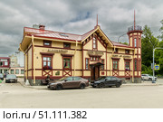 Sortavala, Karelia, Russia - 8 July, 2023: View of the wooden building in the Empire style Berg House. Редакционное фото, фотограф Ольга Сейфутдинова / Фотобанк Лори
